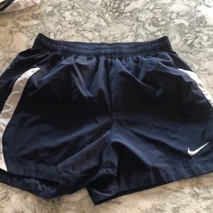 Navy Nike running shorts